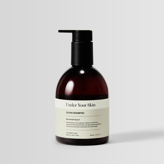 Bottle of Clean Shampoo for daily cleansing and hair purification.