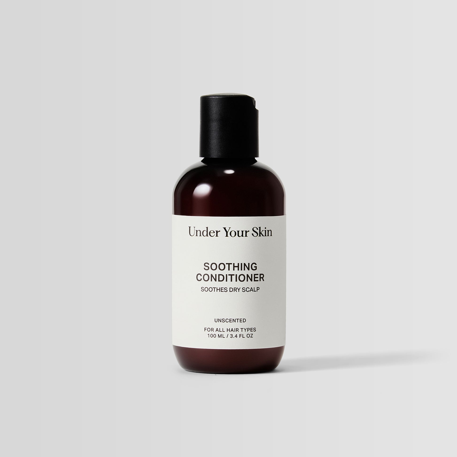 Travel-size bottle of Soothing Conditioner for scalp hydration and soothing